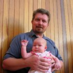 Jay with his 7 week old daughter Desiree