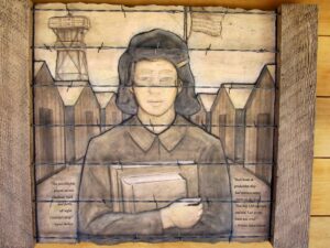 One of the wood block carvings at the Japanese Exclusion Memorial