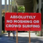 Sign at Bumbershoot: “Absolutely No Moshing or Crowd Surfing”