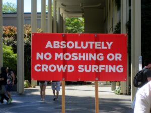 Sign at Bumbershoot: “Absolutely No Moshing or Crowd Surfing”