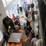 People arriving for the start of WordCamp Nashville, at Watkins College