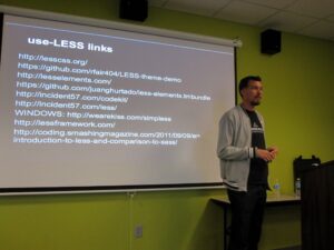@rfair presenting "Less, JS, and WP"